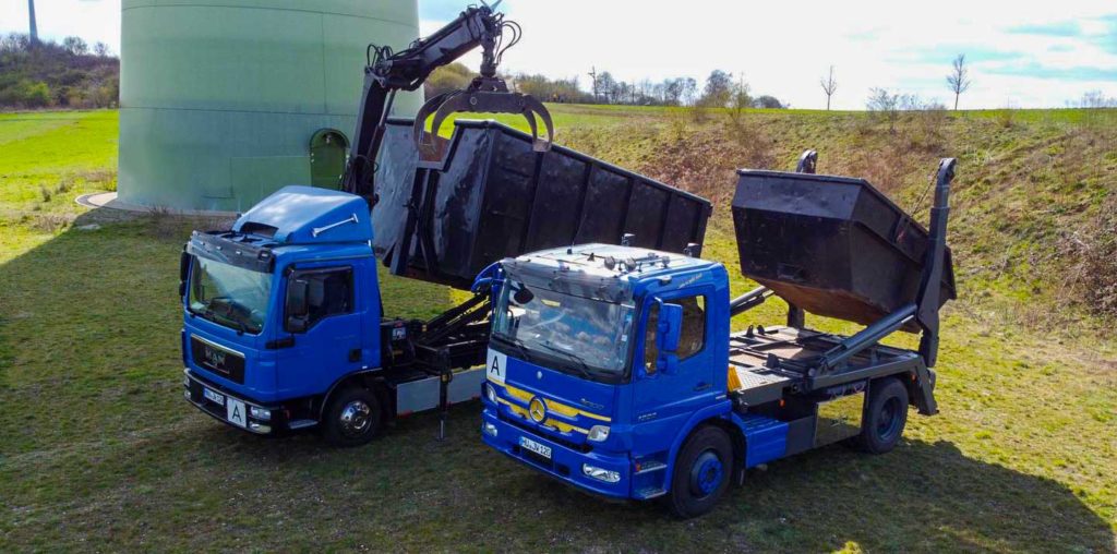 LKW mit Containern | ESOREC Recycling
